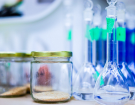 Blurred image of science lab beakers and jars